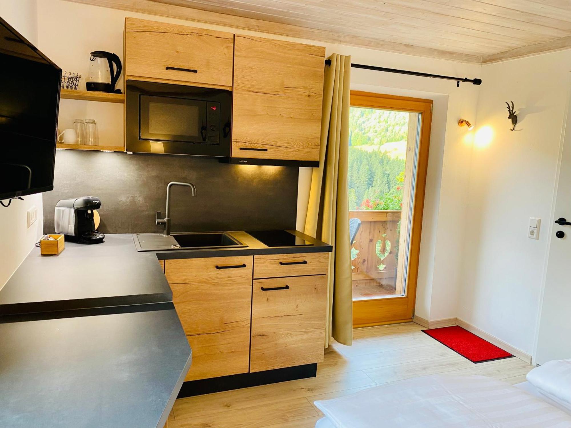 Alm Seasons Premium Chalet & Studios Saalbach-Hinterglemm Habitación foto
