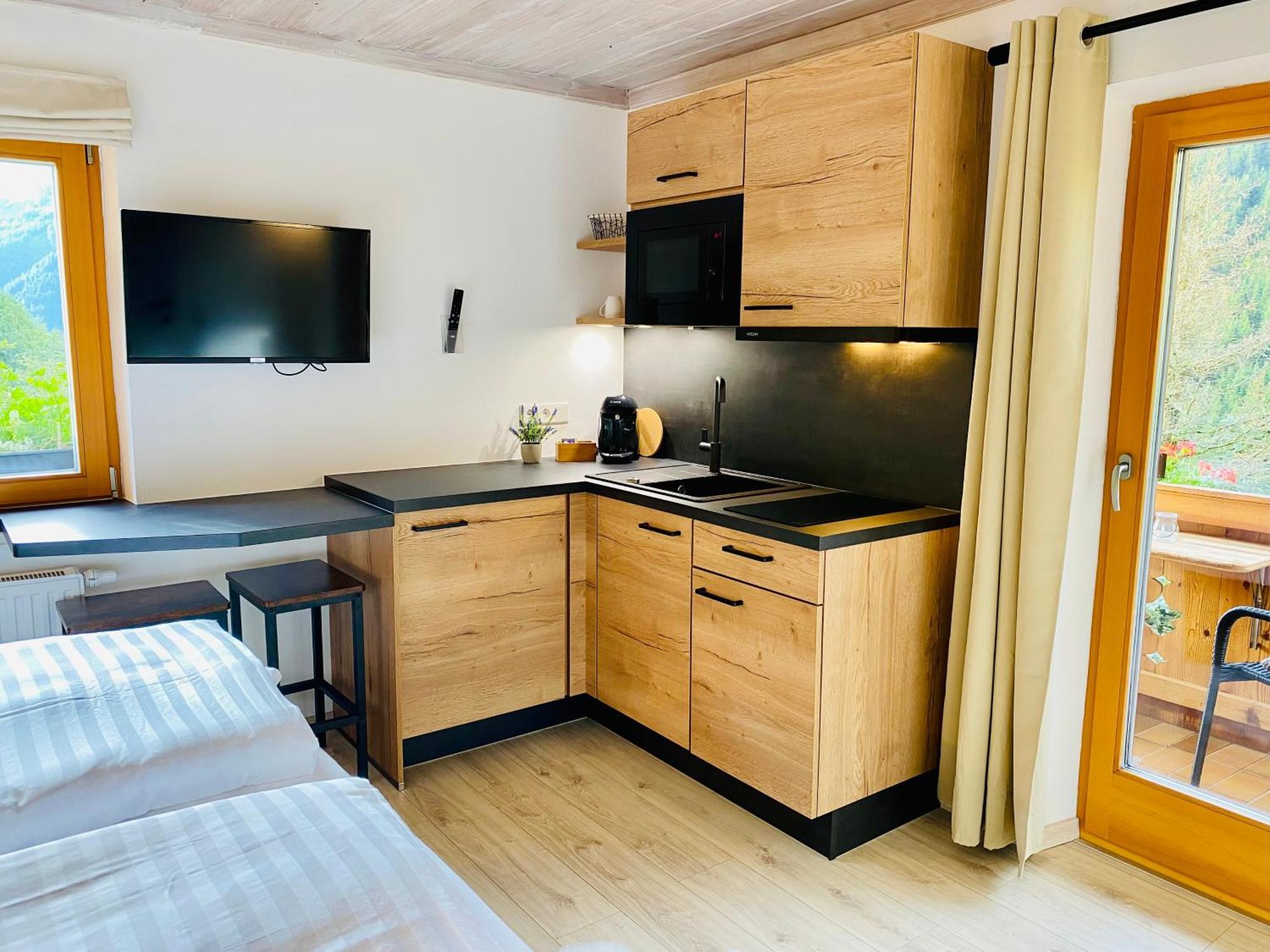 Alm Seasons Premium Chalet & Studios Saalbach-Hinterglemm Habitación foto